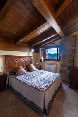 Cama o camas de una habitación en Apartamentos Farrai llova