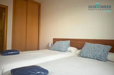 Cama o camas de una habitación en Dos Torres Aragorn - El Burgo de Ebro