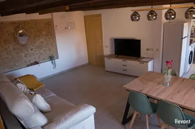 Una televisión o centro de entretenimiento en Casa Garí