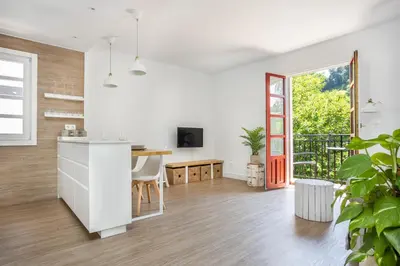 Una televisión o centro de entretenimiento en Apartamento turístico Legate