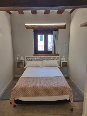 Cama o camas de una habitación en Hostal La Rúa
