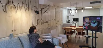 Una televisión o centro de entretenimiento en Apartamento EL PILAR Céntrico en Zaragoza by lodom