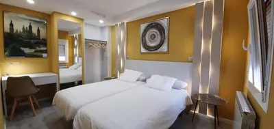 Cama o camas de una habitación en Apartamento NATURA Céntrico en Zaragoza by lodom