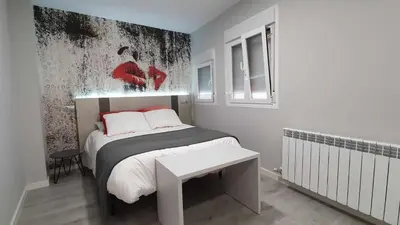 Cama o camas de una habitación en Apartamento NATURA Céntrico en Zaragoza by lodom