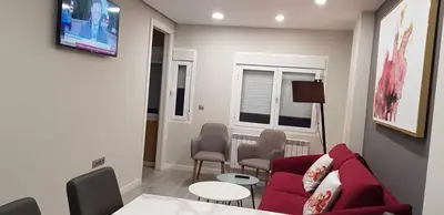 Una televisión o centro de entretenimiento en Apartamento NATURA Céntrico en Zaragoza by lodom