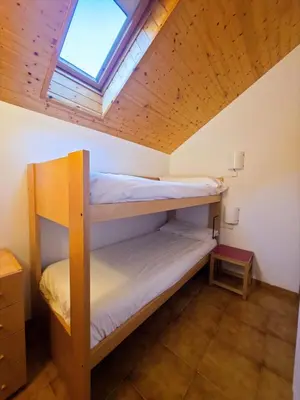 Cama o camas de una habitación en Apartaments Vall Ferrera