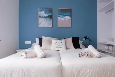Cama o camas de una habitación en Dos Torres Exclusivos en Calle Alfonso I