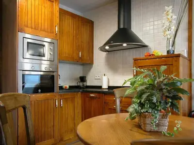 Una cocina o zona de cocina en Apartamentos Pistolo