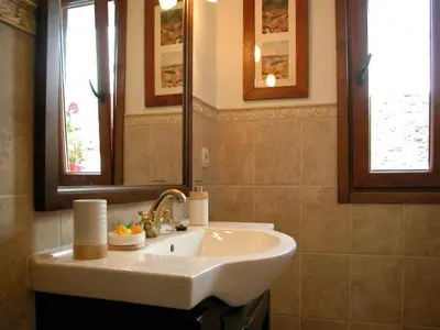 Un baño de Apartamentos Pistolo