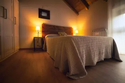 Cama o camas de una habitación en Apartamentos Camino de la Val
