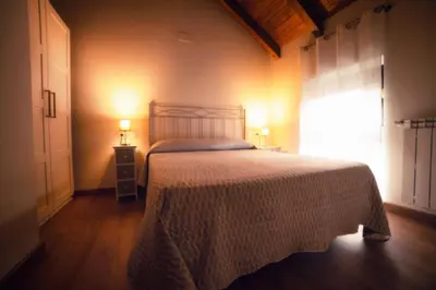 Cama o camas de una habitación en Apartamentos Camino de la Val