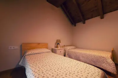 Cama o camas de una habitación en Apartamentos Camino de la Val