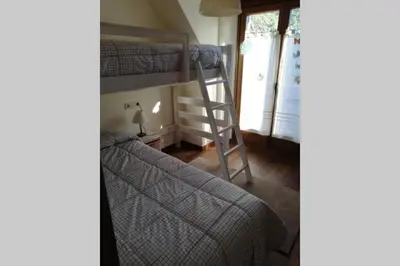 Cama o camas de una habitación en Espectacular ático duplex en Isil
