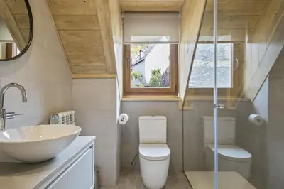 Un baño de Luderna - Dúplex Sabiera