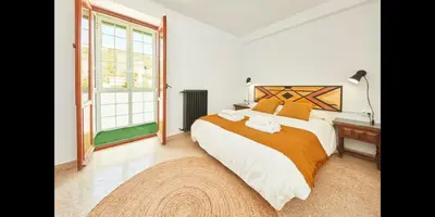 Cama o camas de una habitación en GUEST HOUSE BOLTAÑA