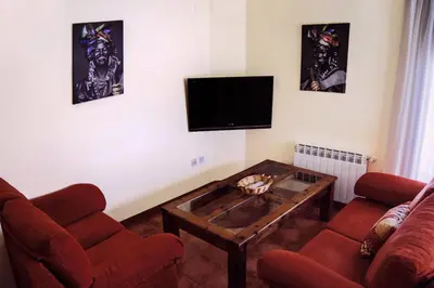 Una televisión o centro de entretenimiento en Casa El Sastre III