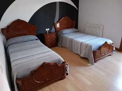 Cama o camas de una habitación en Apartamento turístico Larraga