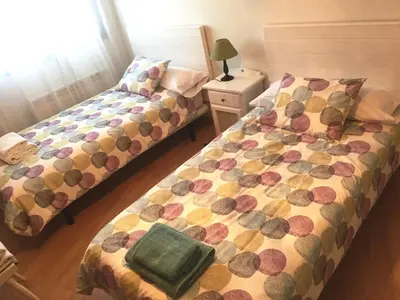 Cama o camas de una habitación en Apartamentos Mequedo