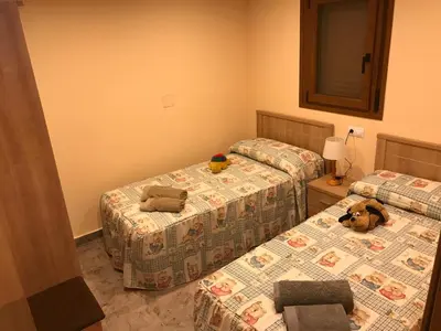 Cama o camas de una habitación en Apartamentos Mequedo