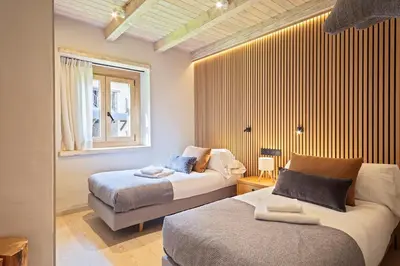 Cama o camas de una habitación en Luderna - Apartamento con jardín Crabera