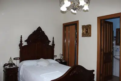 Cama o camas de una habitación en Casa Rural Laura