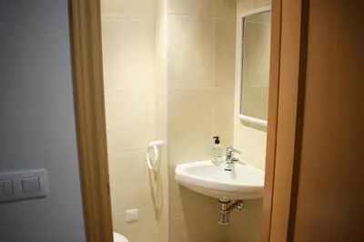 Un baño de Argualas - Triplex con piscina - By CARDI Suites
