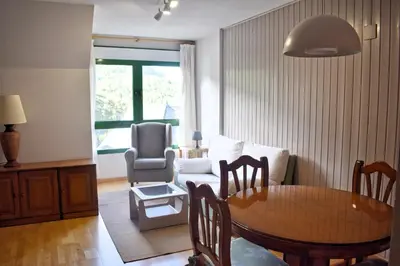 Zona de estar de Argualas - Triplex con piscina - By CARDI Suites