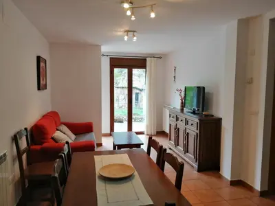 Una televisión o centro de entretenimiento en Apartamentos Mobison