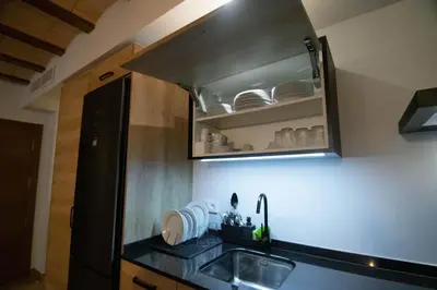 Una cocina o zona de cocina en Cal Negret Rural Apartments