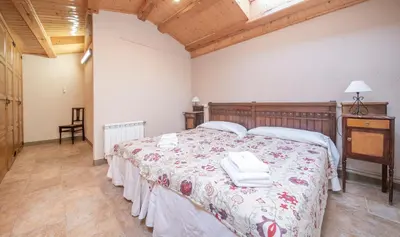 Cama o camas de una habitación en Cal Giral II
