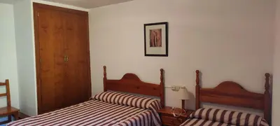Cama o camas de una habitación en Apartamento Miguel Torla Ordesa