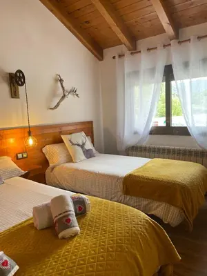 Cama o camas de una habitación en DUPLEX ALPINO