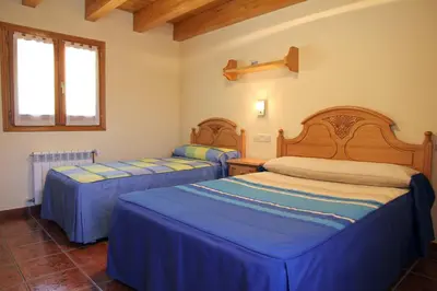 Cama o camas de una habitación en Apartamentos Chuanon