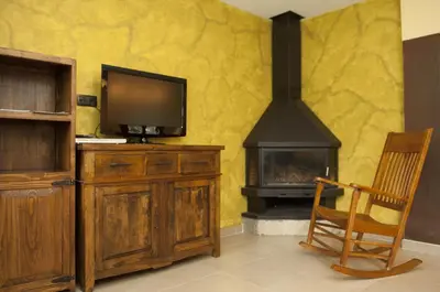 Una televisión o centro de entretenimiento en Casas la Ribera Ordesa