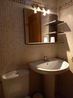 Un baño de Apartamentos Tuara