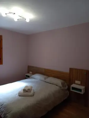 Cama o camas de una habitación en Apartamentos Tuara