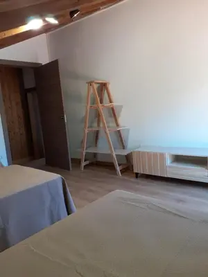 Cama o camas de una habitación en Casa Biñuales