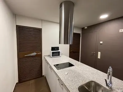Una televisión o centro de entretenimiento en Apartaments Parapent Fly Escales
