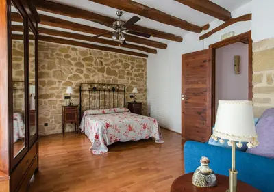 Cama o camas de una habitación en Cal Tomas, Ecoturisme Terra Alta