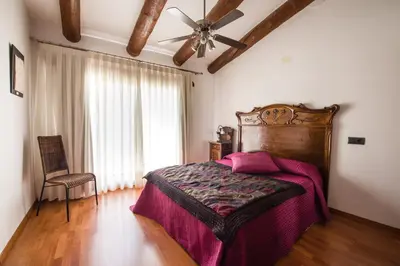 Cama o camas de una habitación en Cal Tomas, Ecoturisme Terra Alta