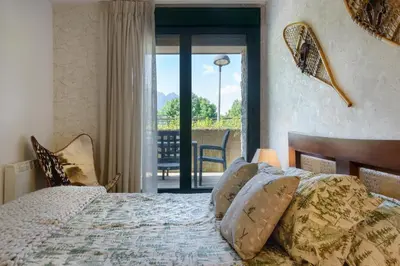Cama o camas de una habitación en Peña Sabocos II Apartamento Turístico Panticosa