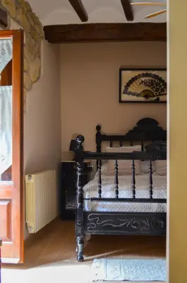 Cama o camas de una habitación en CAL MILIO