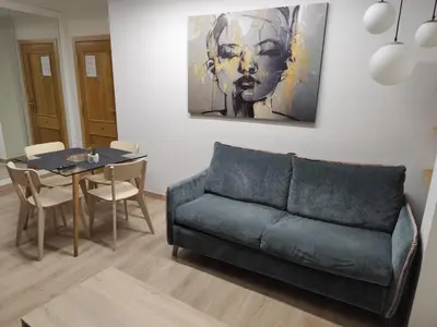 Zona de estar de Apartamentos El Pilar