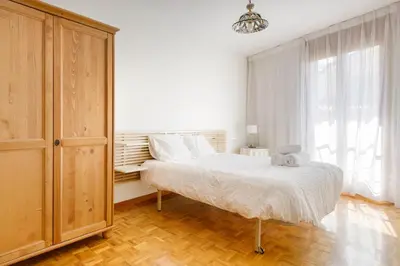 Cama o camas de una habitación en Alojamiento Turístico Calle Mayor Jaca