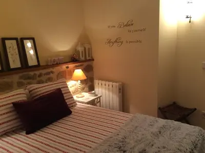 Cama o camas de una habitación en La Casa de Baix