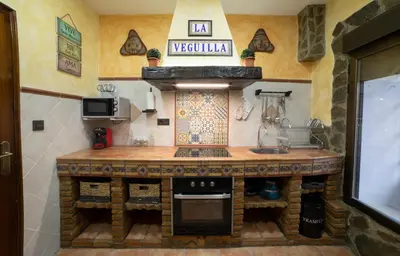 Una cocina o zona de cocina en APARTAMENTO LA VEGUILLA