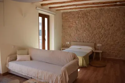 Cama o camas de una habitación en Apartaments Casa el Metge