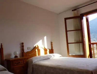 Cama o camas de una habitación en Casa planominguero