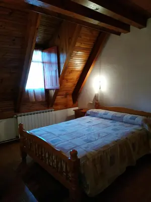 Cama o camas de una habitación en Pension Casat