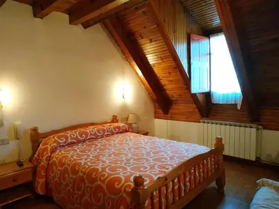 Cama o camas de una habitación en Pension Casat